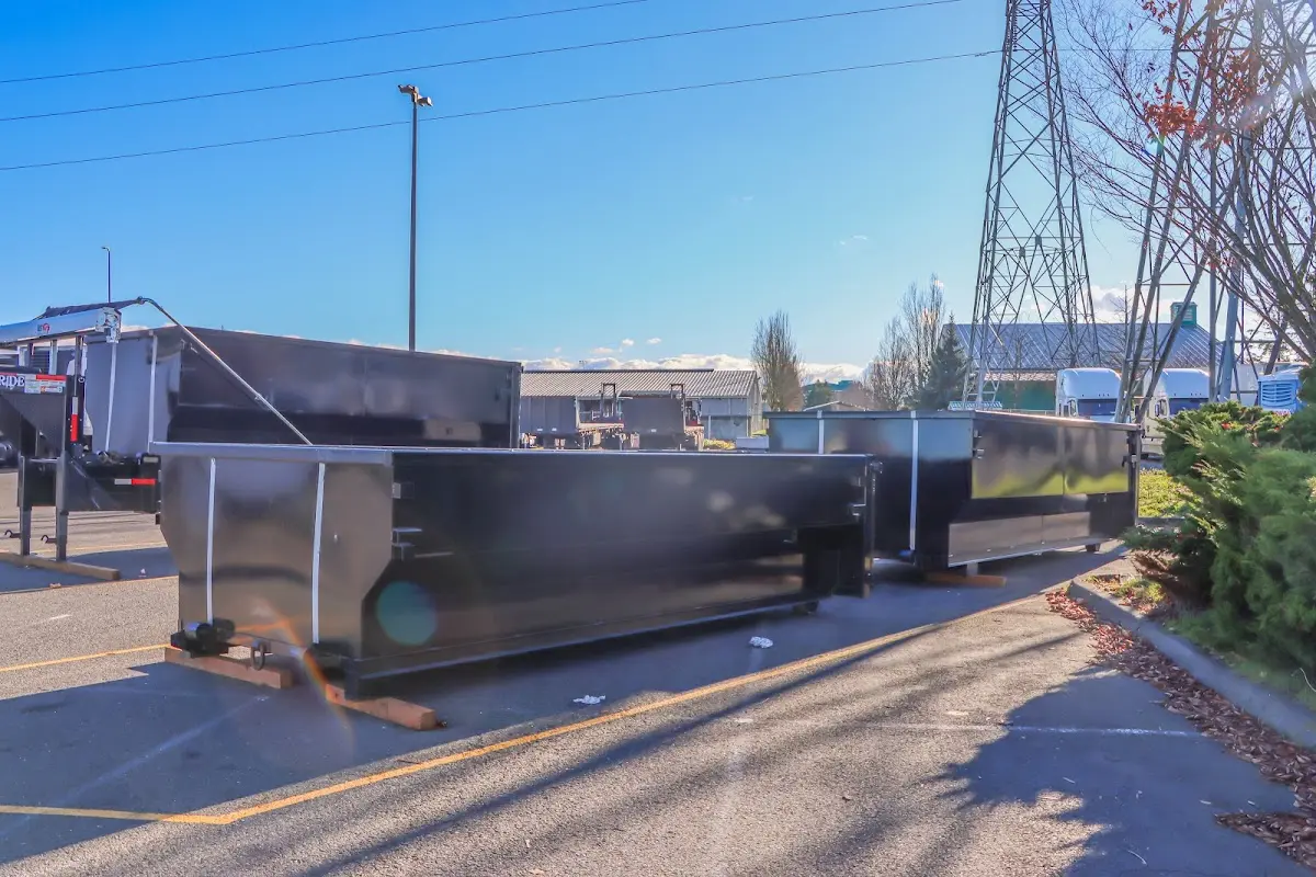 Roll-off dumpster ready for waste disposal at job site for Residential Dumpster Rental in Bryan